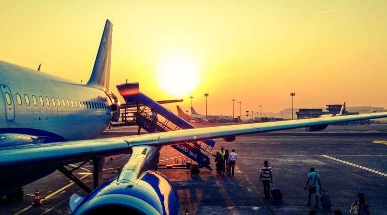 passengers boarding plane